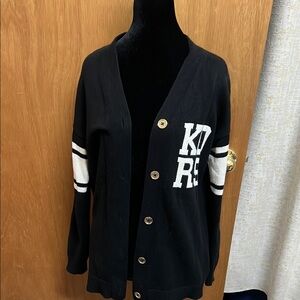 M Kors Varsity Cardigan black/white with White Lettering.